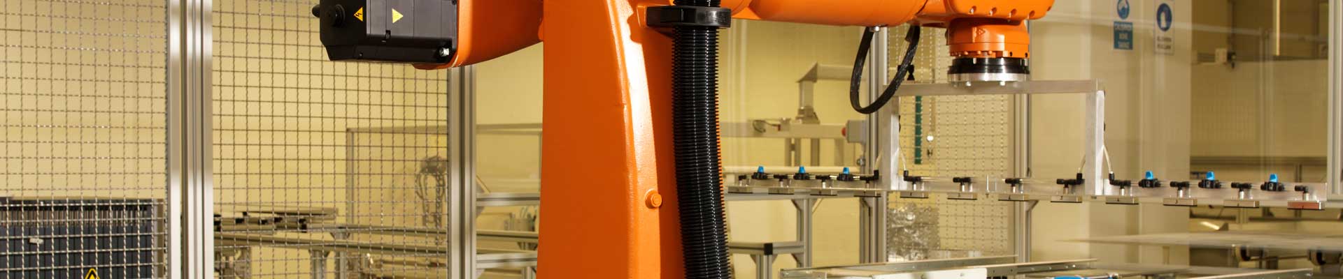 Conveyors and Robots To Link Machines ”